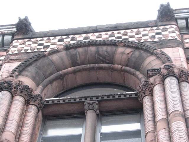 Polychromatic patterns run across the top of the 1894 firehouse.