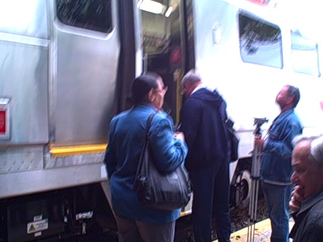 Riders boarding the Silverliner V at Cynwyd.