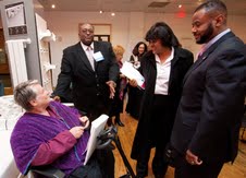 Members of City Council talk to visitability advocate Eleanor Smith during an October charrette