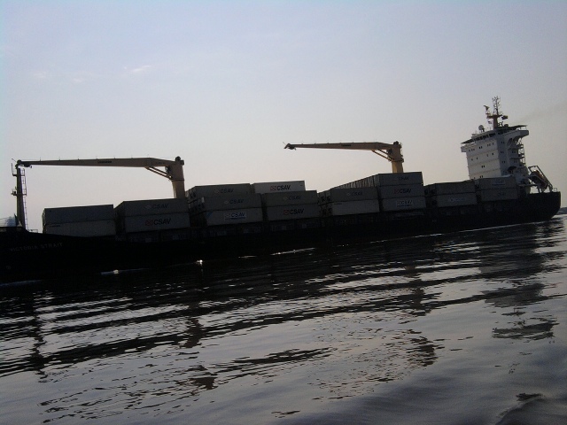 A closer view of the freighter