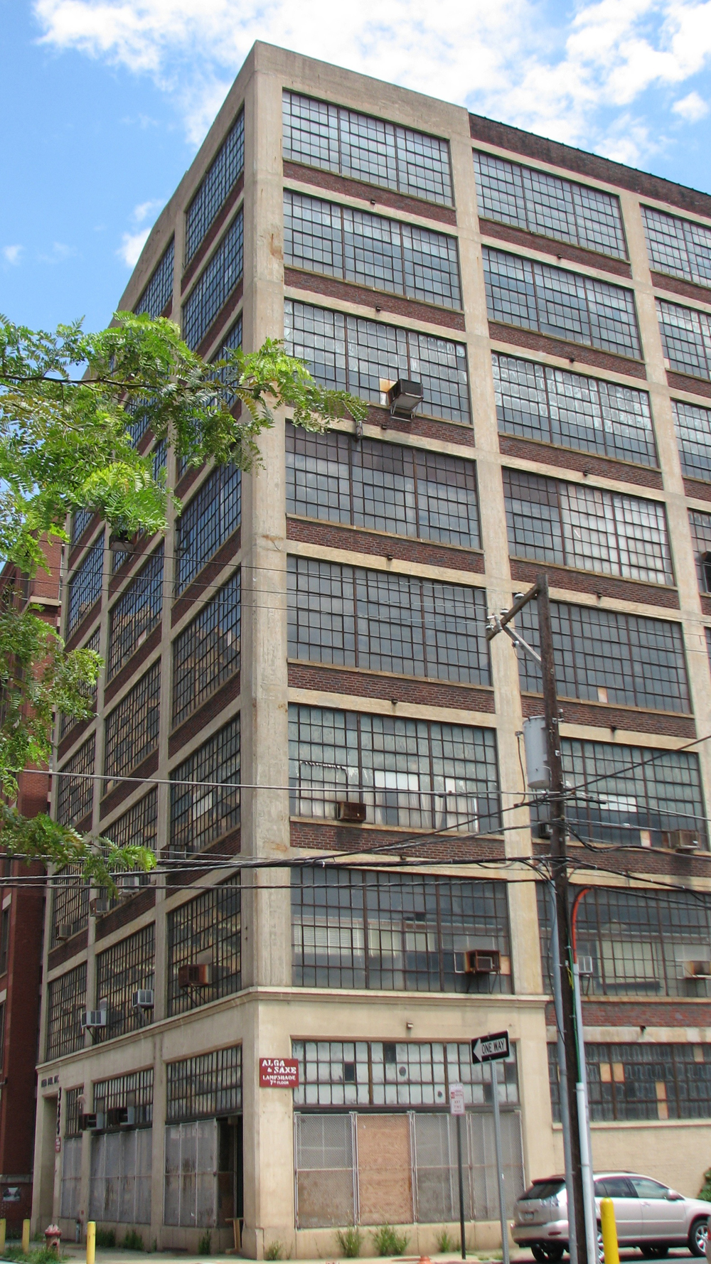 The Heid Building, designed by J. Franklin Stuckert, exemplifies 1920s concrete and steel industrial architecture. 