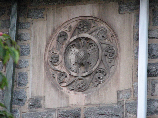 A distinctive medallion shared by the twin homes also appears on several other houses in Overbrook Farms