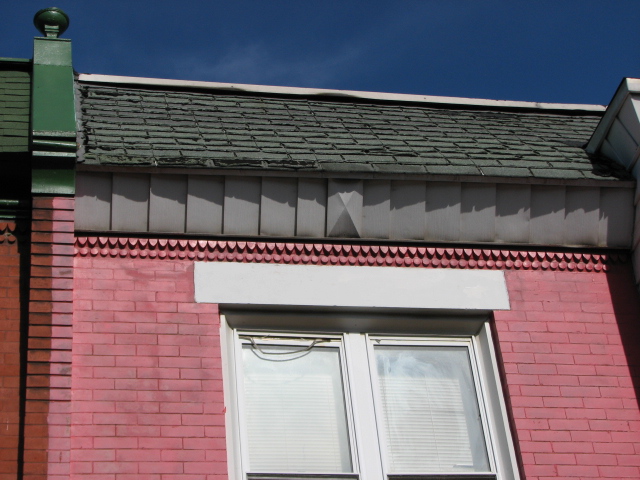 Decorative brick styles and corbels were used throughout the block.