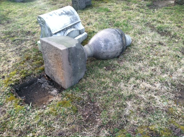 One of the many vandalized grave markers at The Woodlands. | courtesy of Jessica Baumert, The Woodlands