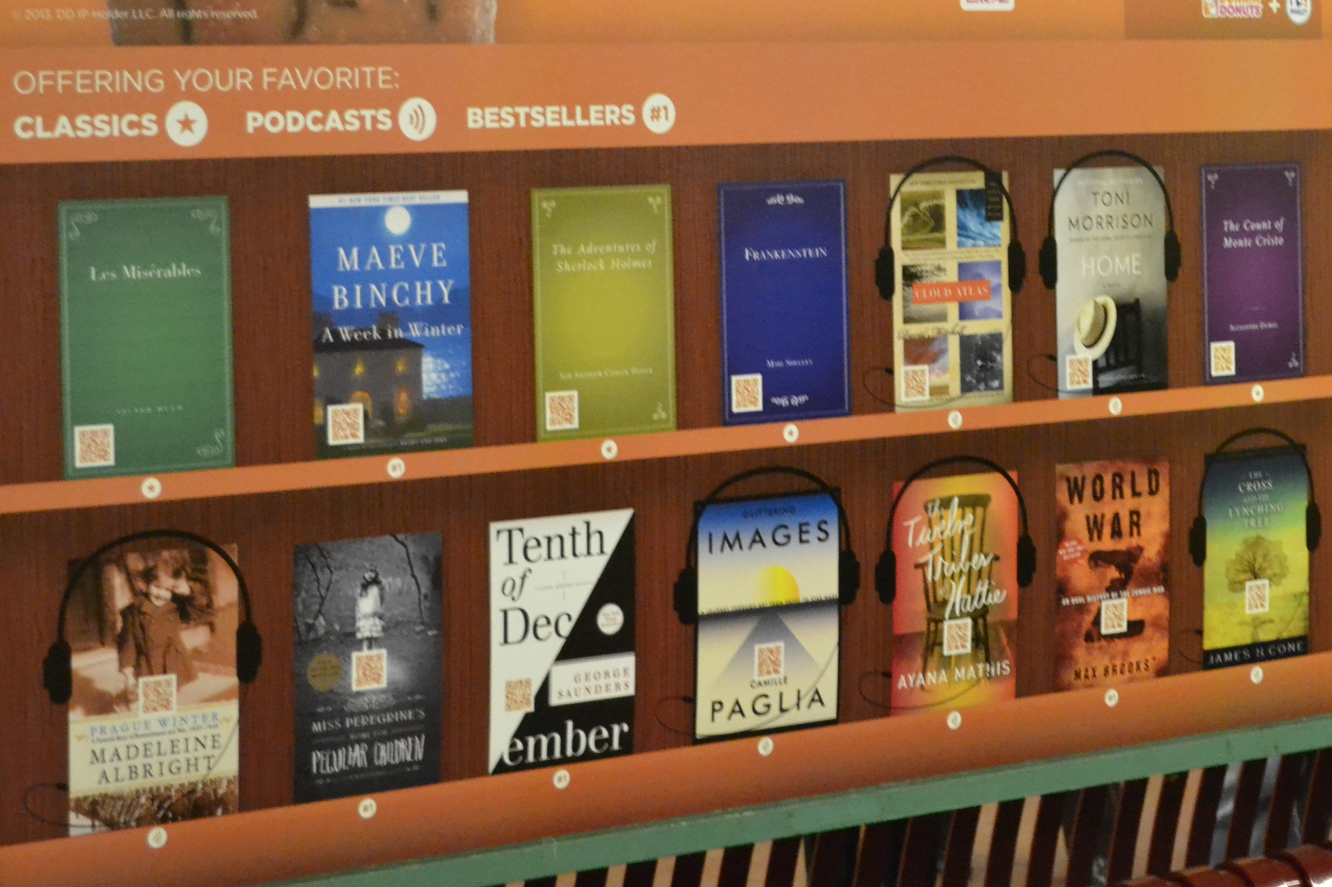 Each book cover included in the library has a QR code which passengers can scan to access the book or podcast content