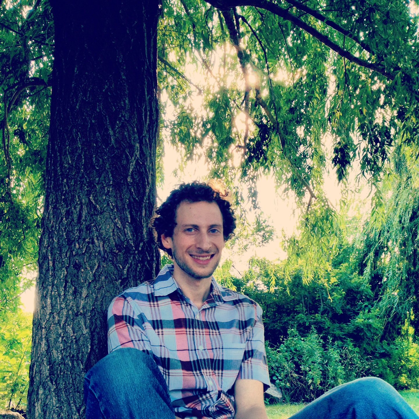 Alex B. under a tree in Penn Treaty Park.