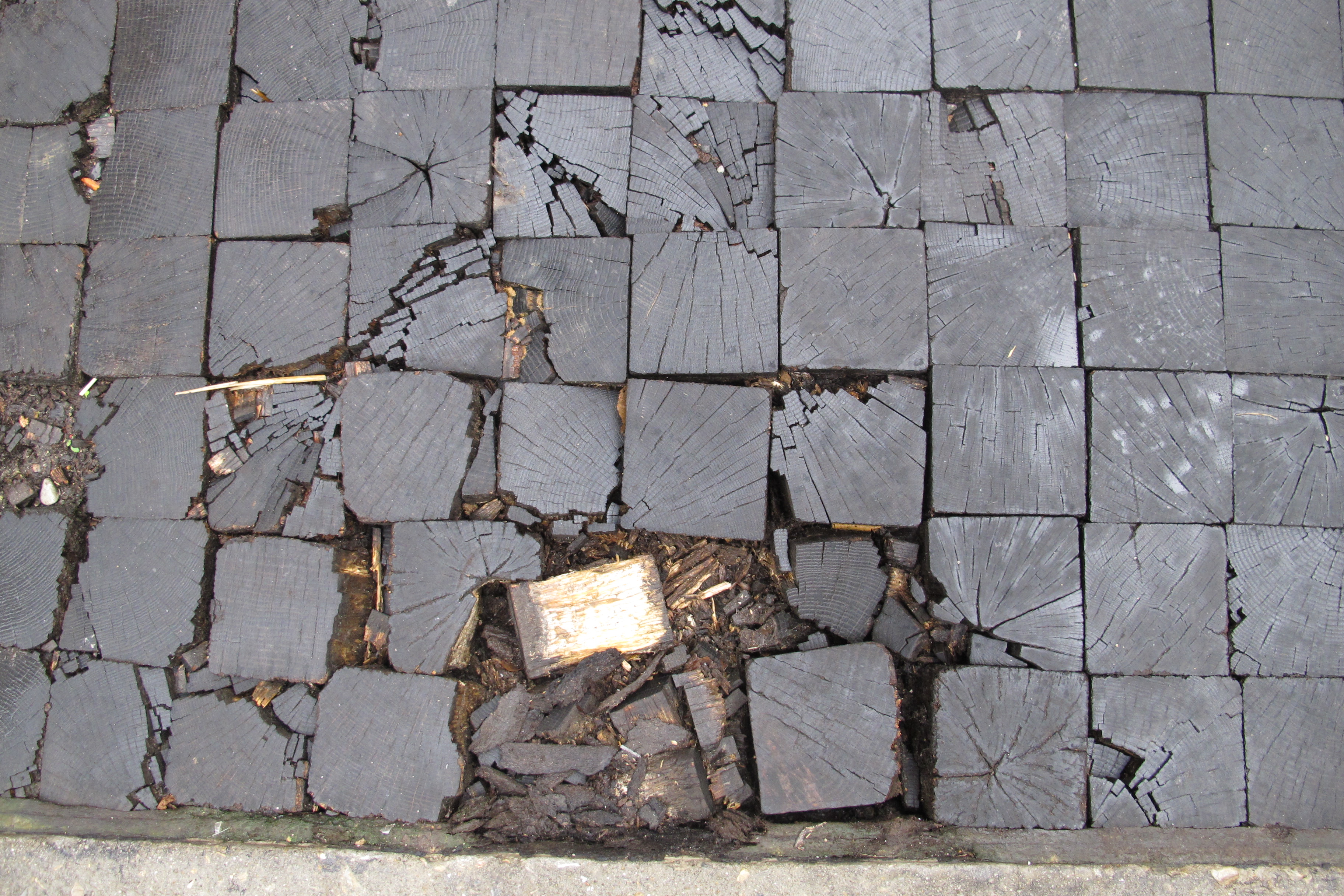 Camac Street's oak block pavers were getting chewed up. (October 9, 2012)