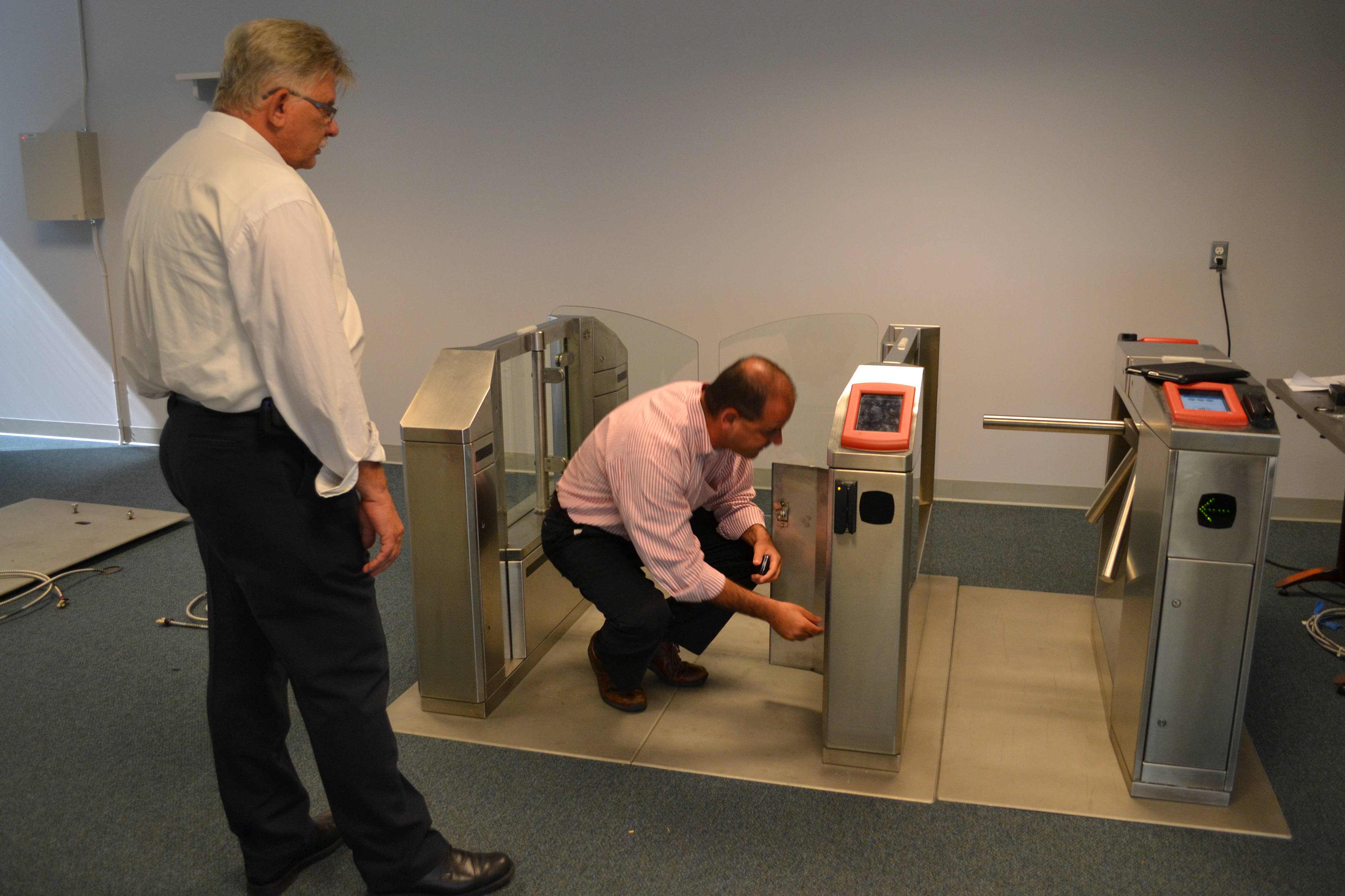 NPT Senior Project Manager Thomas Carl and Revenue Officer Sam Sulaiman tested the fare gates