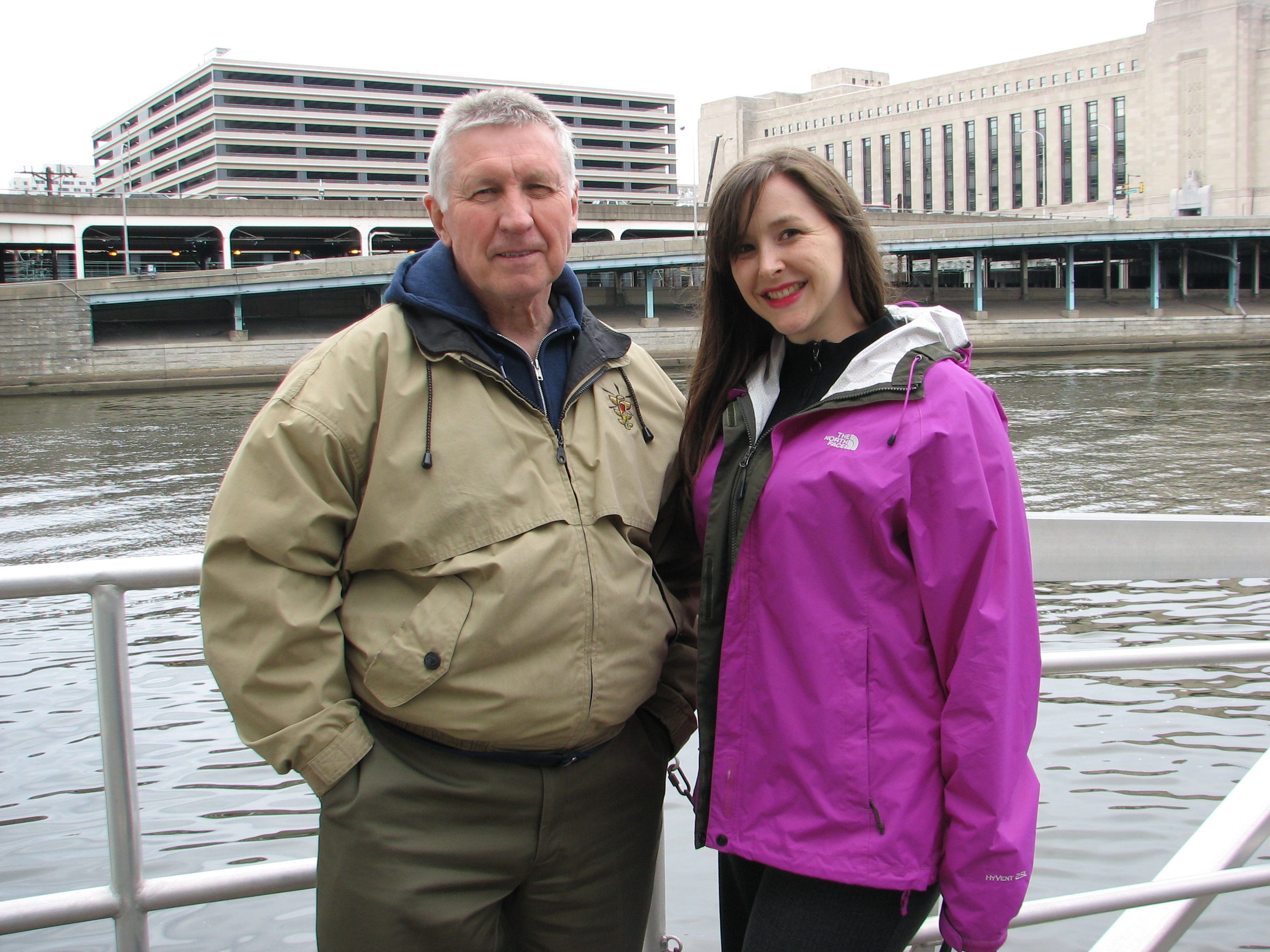 Syrnick and Gray standing on the SRDC's boat launch at Walnut Street along Schulkill Banks, from where river boat tours will depart.