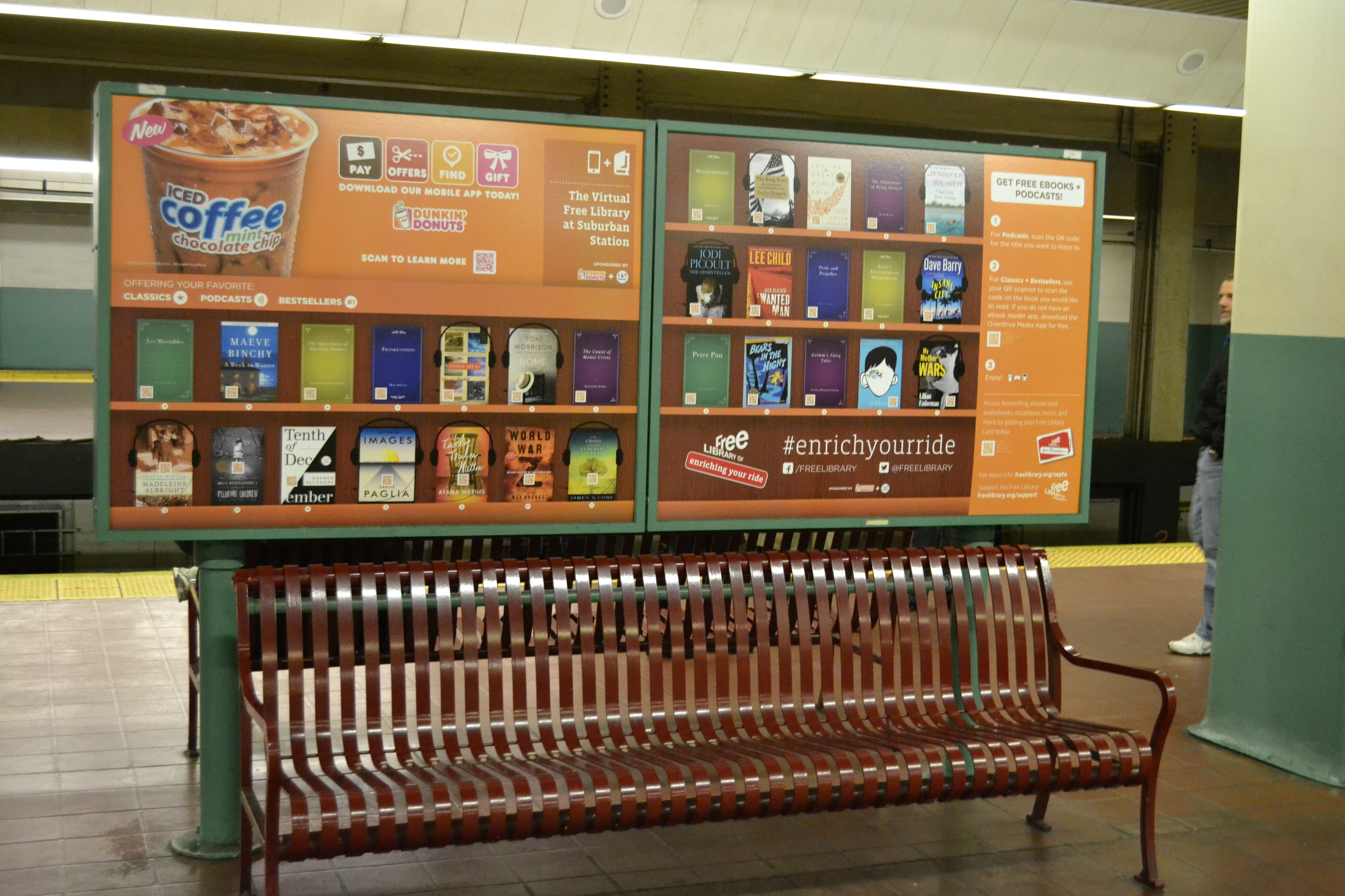 Seventy-six ad boards have been converted into bookshelves from which riders can choose among roughly 50 free titles