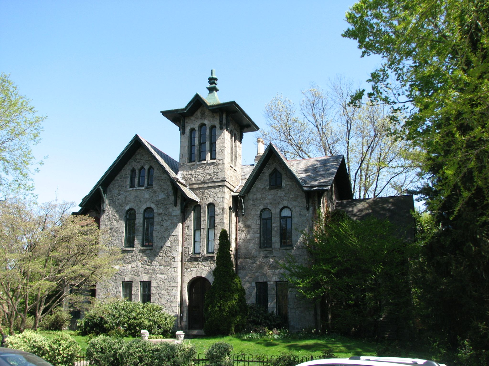 The severe Van Dyke Residence, 150 West Walnut, is also attributed to Samuel Sloan.