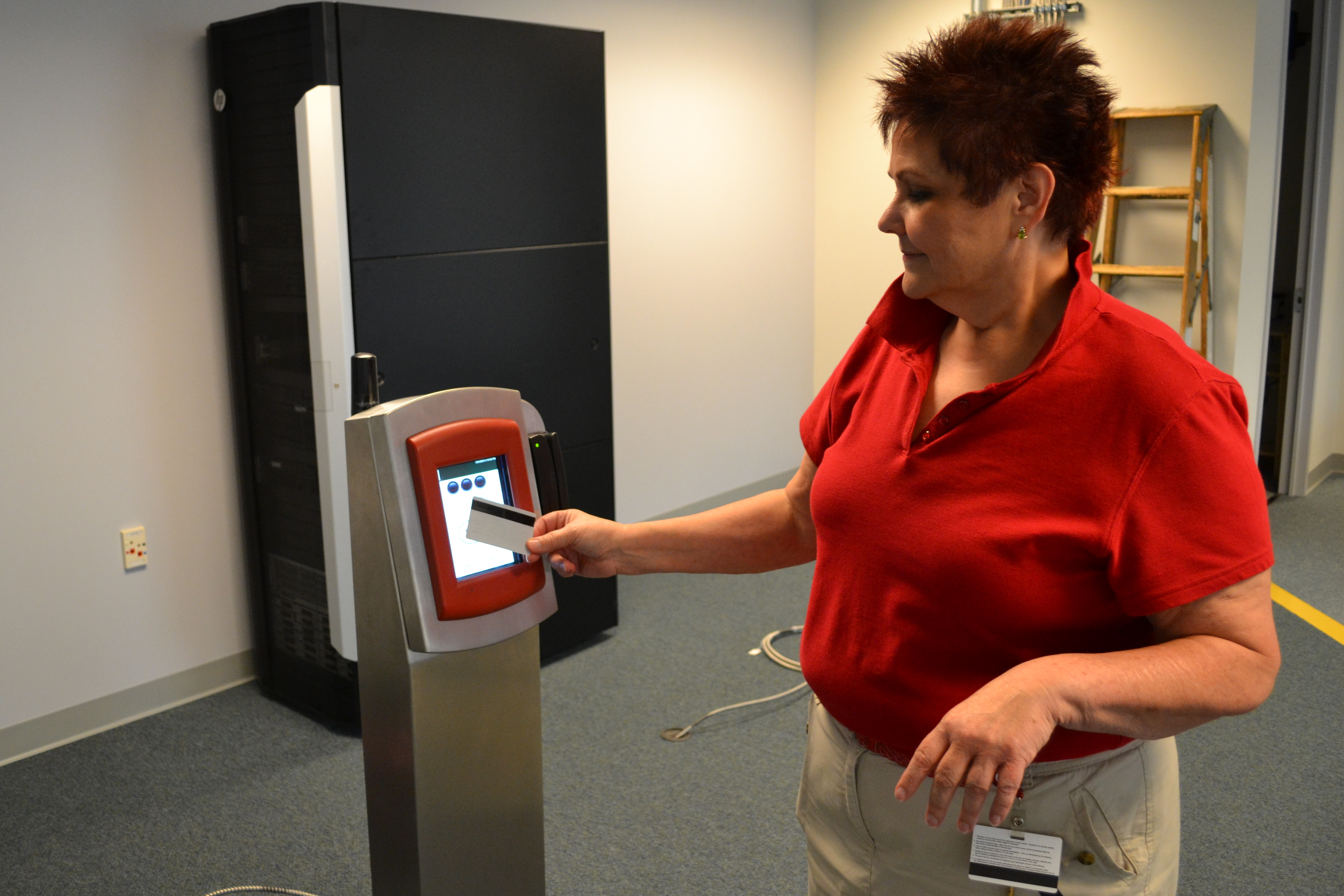 Leslie Hickman, deputy chief officer of NPT Integration, demonstrated how passengers will tap card readers at the outlying regional rail stations