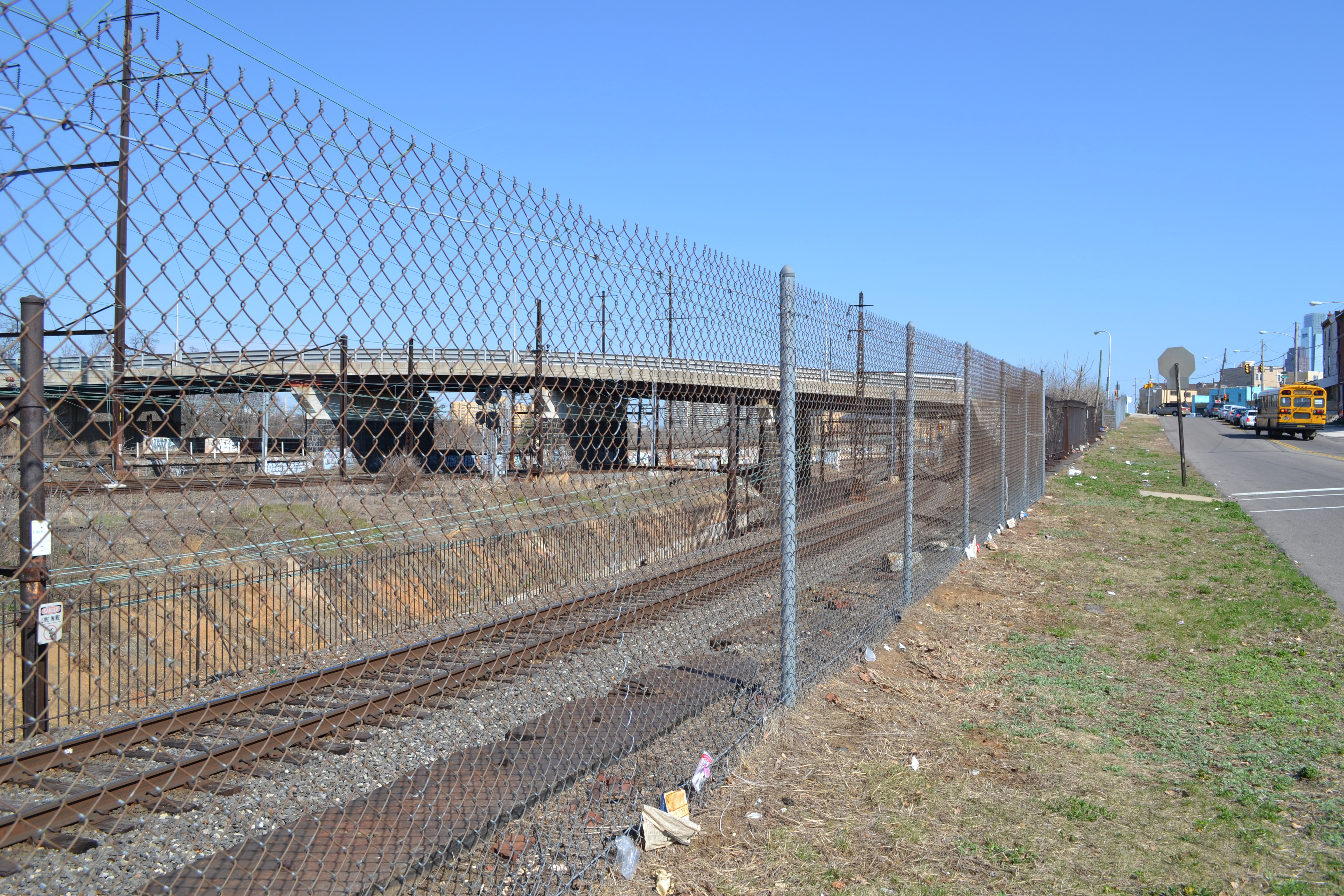 A chain link fence is all that stands between the northern border of Mantua and Amtrak's property