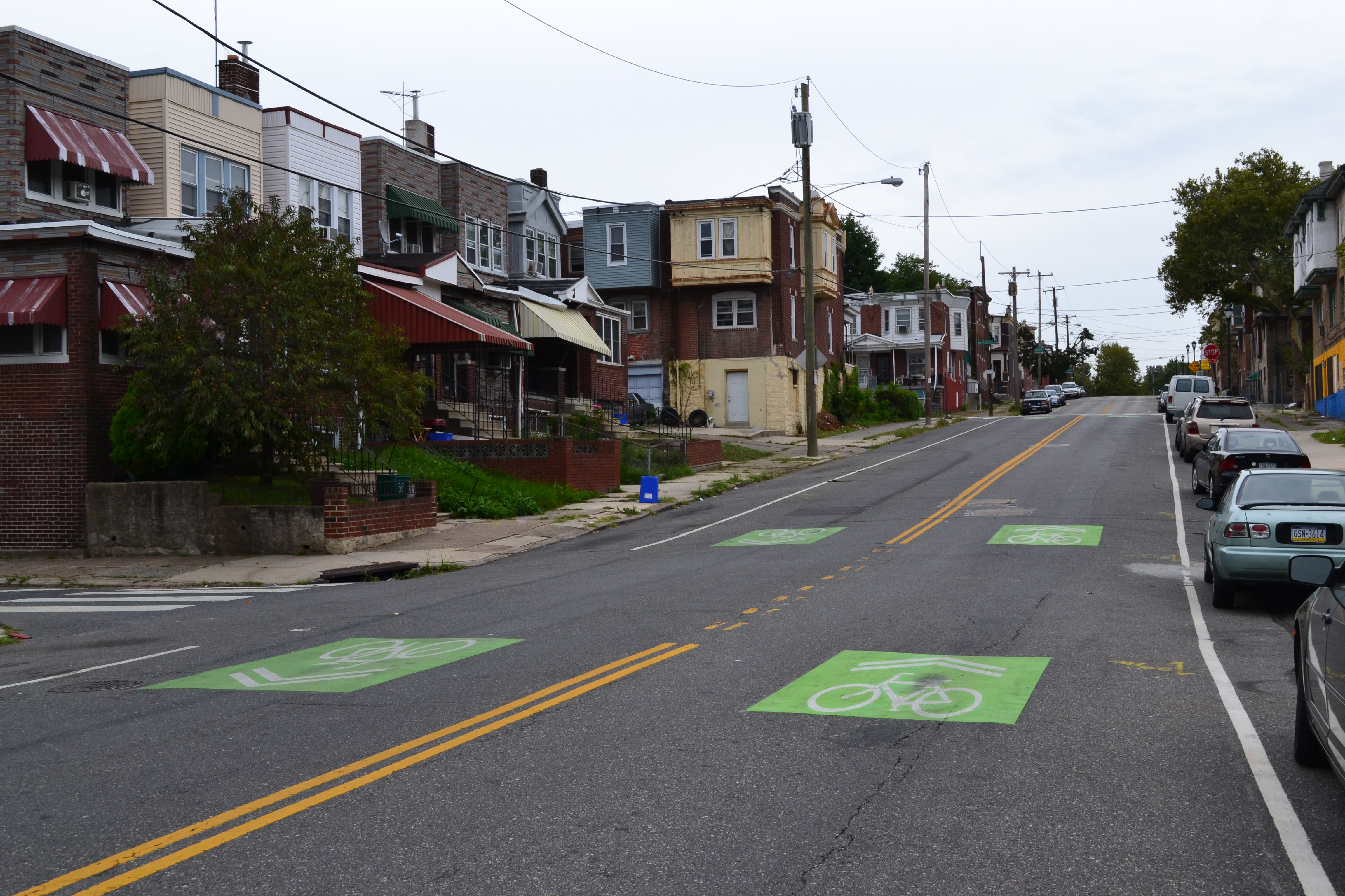Green sharrows lead cyclists from the Cobbs Creek Trail to the 58th Street Greenway, a mostly off-road trail