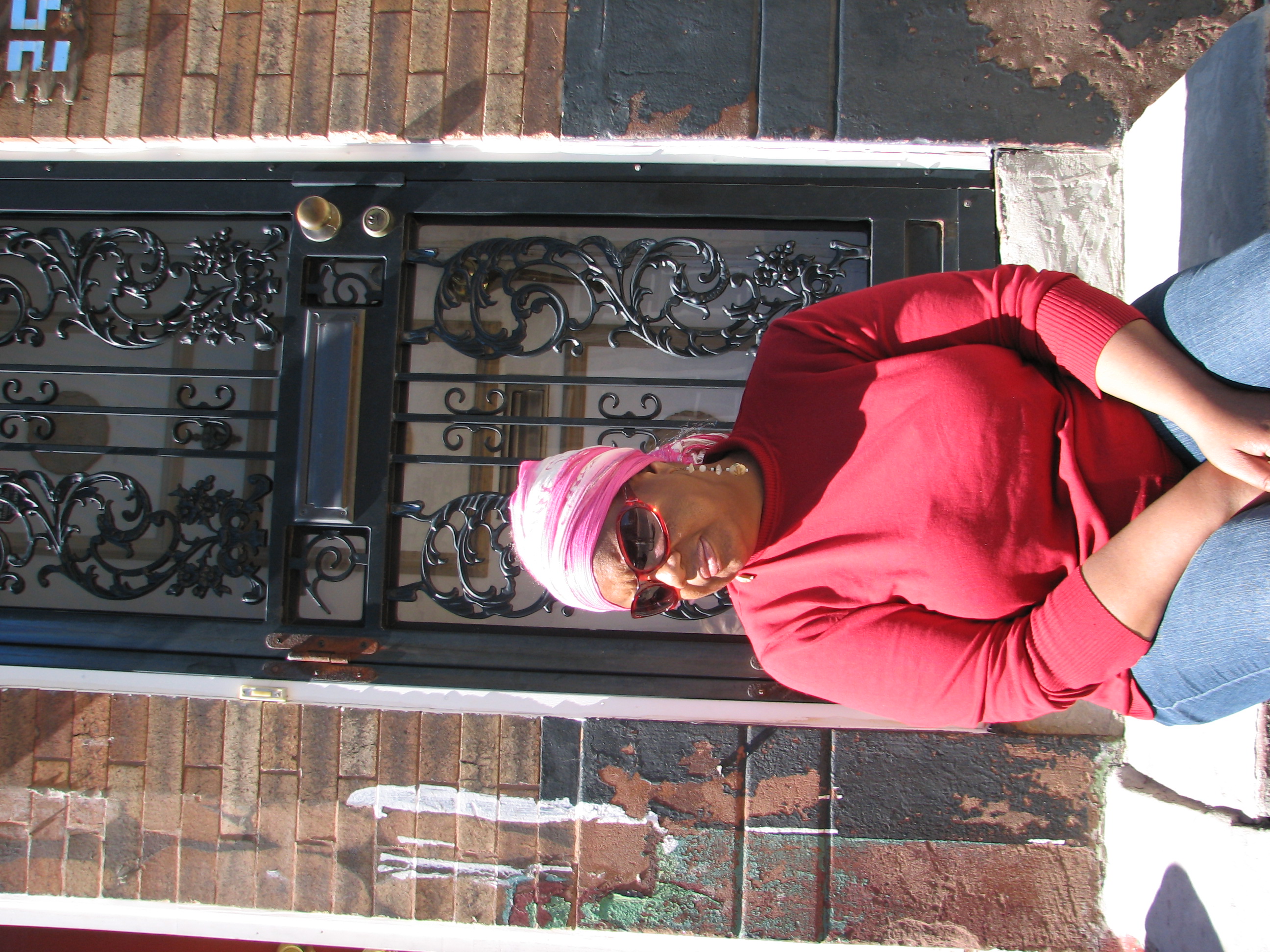 Judith Robinson on the stoop of her childhood home