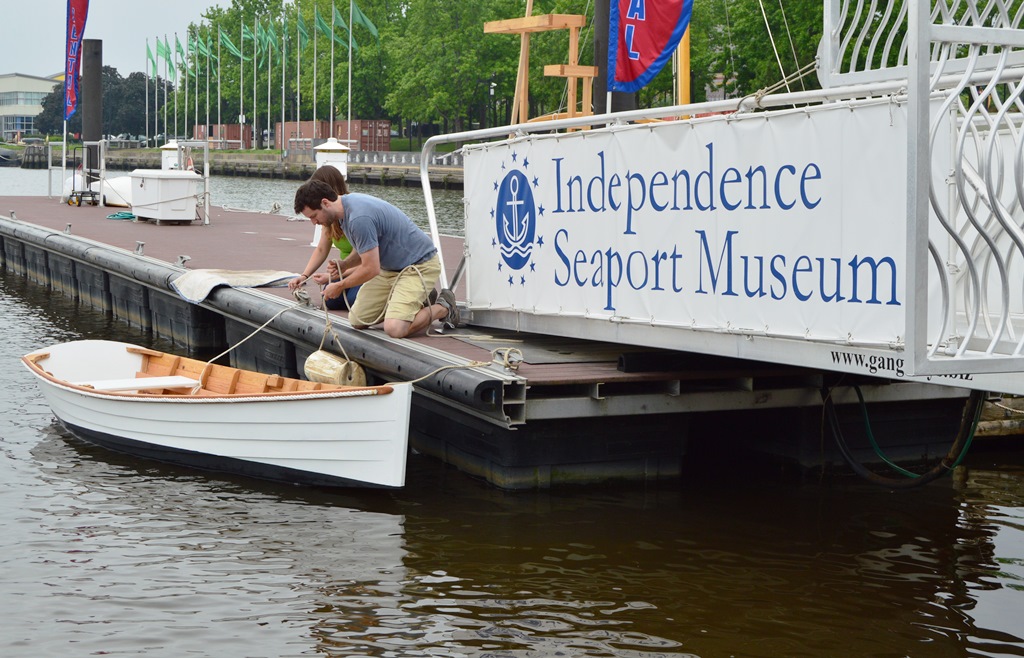 Launching the skiff Nemo, which was built at the museum.