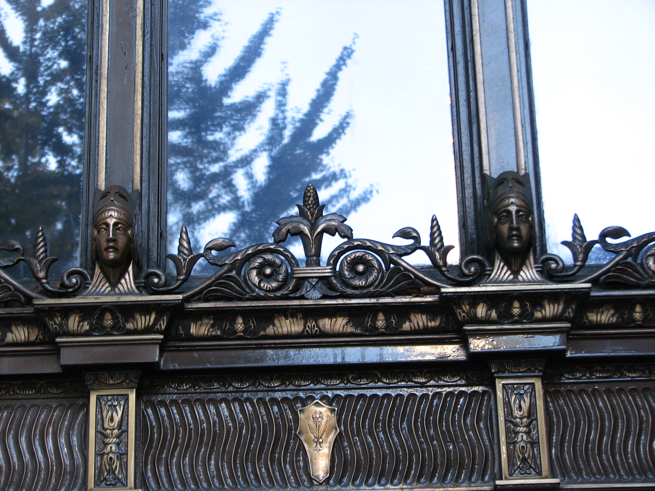 Fine ironwork surrounds the entrances to the building.