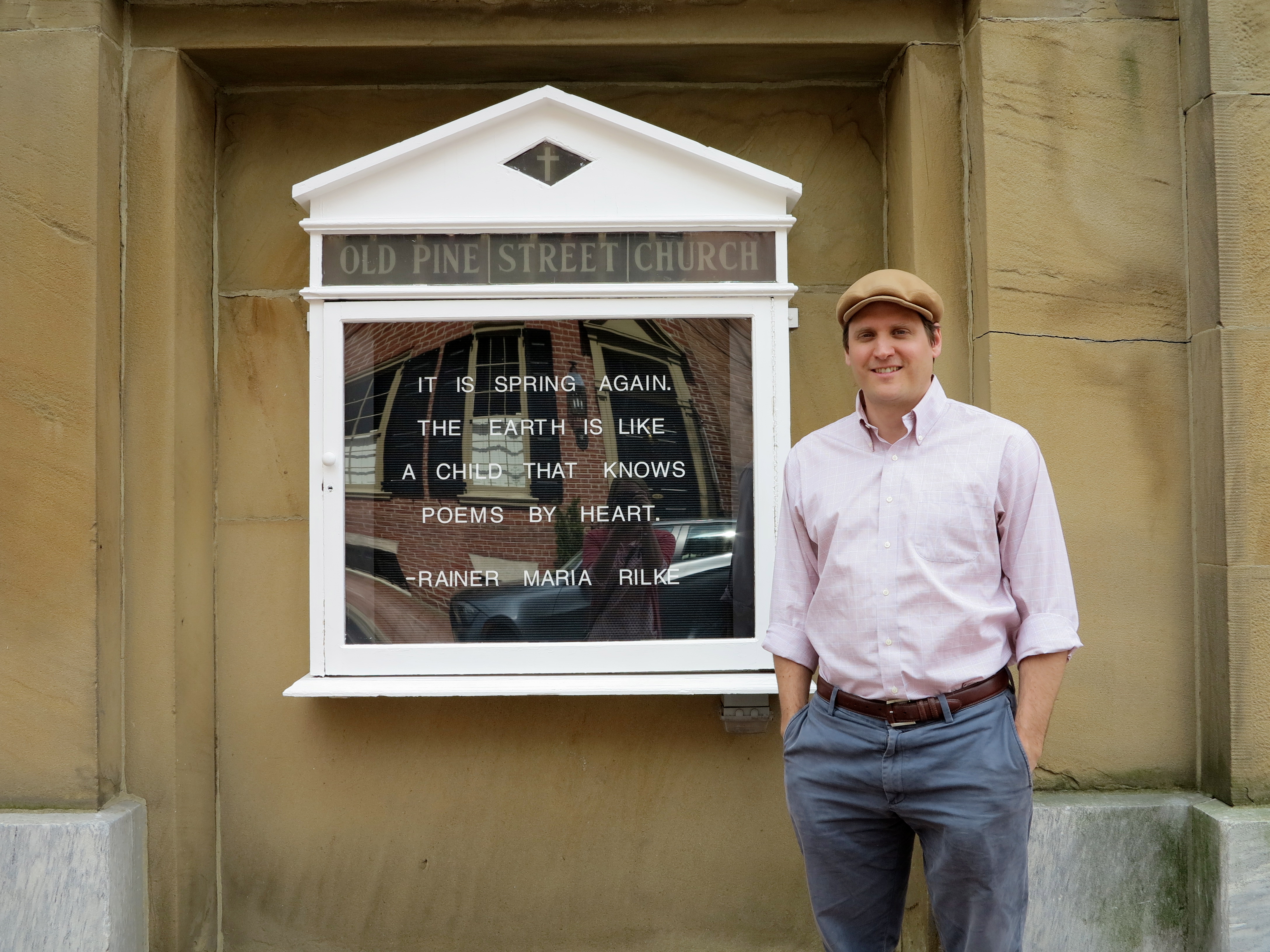 Rev. Jason Ferris and the Old Pine Street Church signboard
