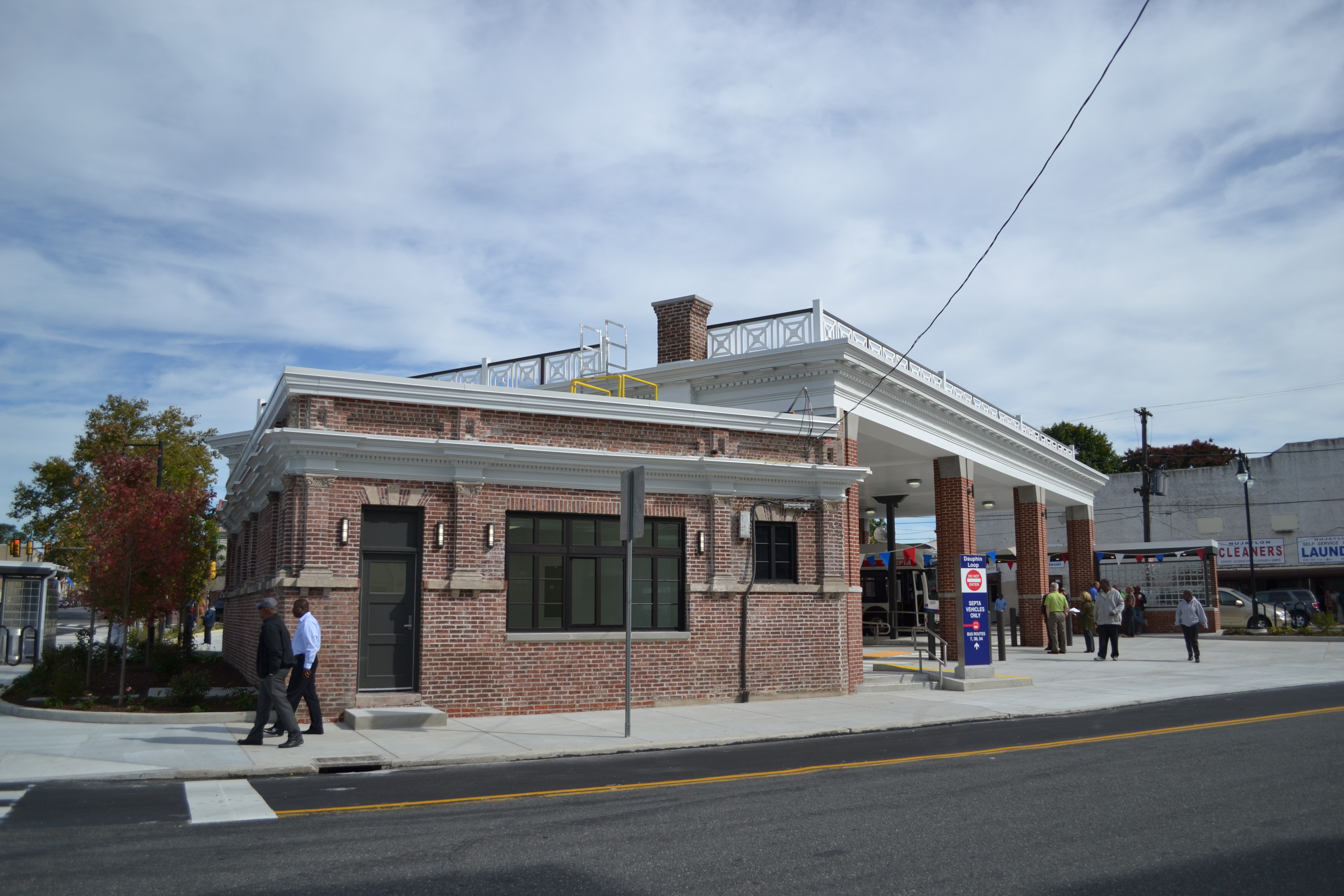 SEPTA preserved and restored the bus loop building, left, and replaced the bus canopy, right, using some of the original bricks