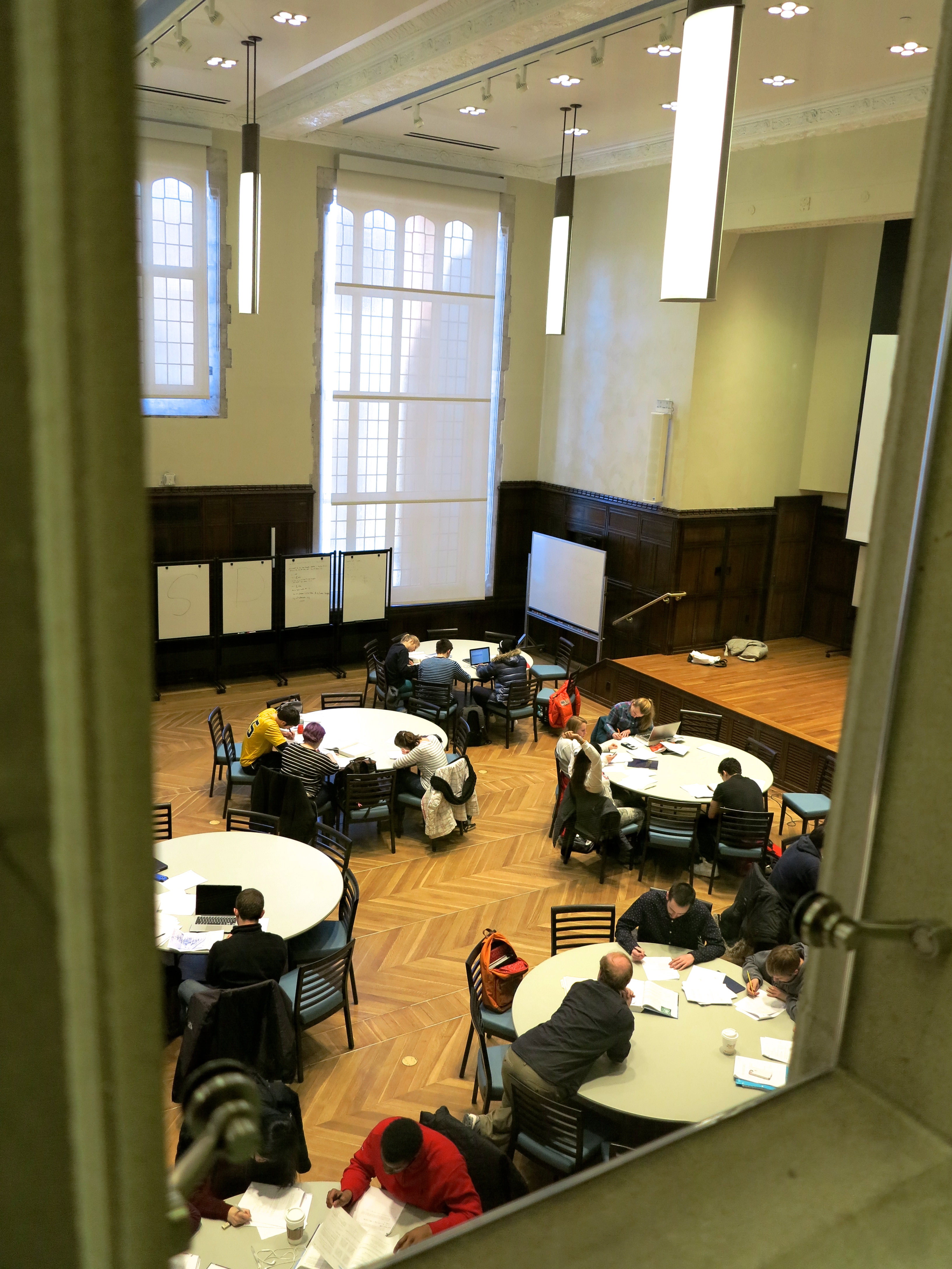 The ARCH auditorium, class in session in an active learning configuration 