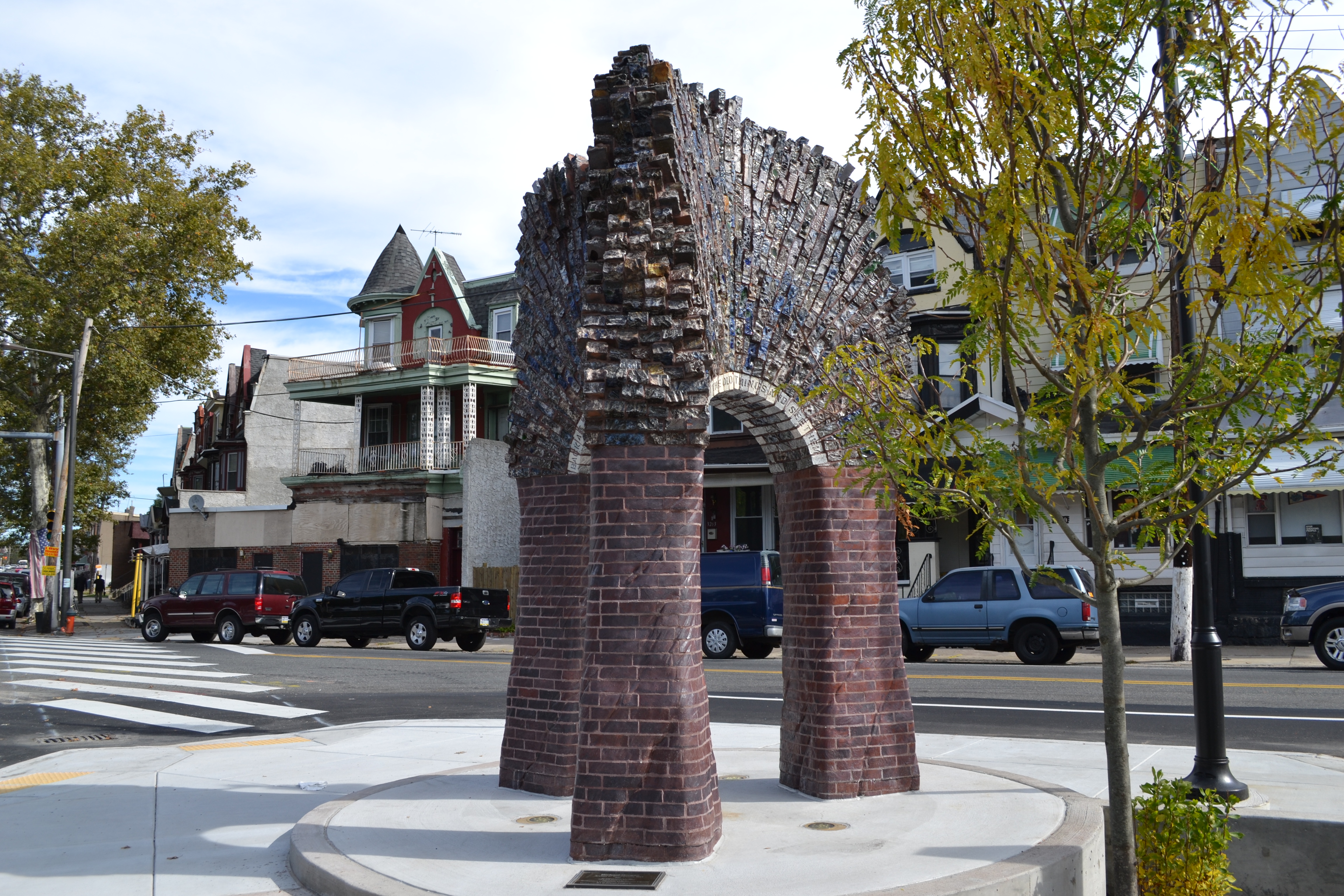 The Arches of Resurgence Art in Transit installation stands at the intersection of the park, bus loop and community