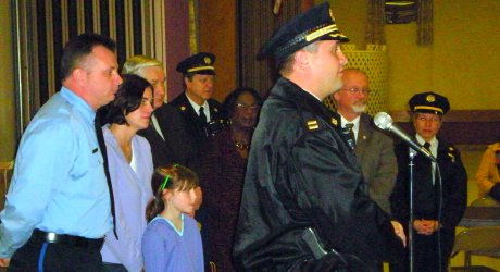 At left Community Relations officer Mark Mroz standing with his wife Kelly and daughter Rachel. Beside them are Council members Jack Kelly, Marian Tasco, Bill Greenlee and a 2nd district lieutenant. S
