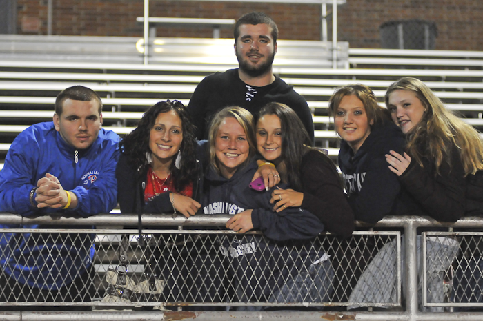On a bundle up night when the Phillies were playing in the fourth game of the World Series, some folks, like these Washington High friends, still came out to cheer for and support their  school'