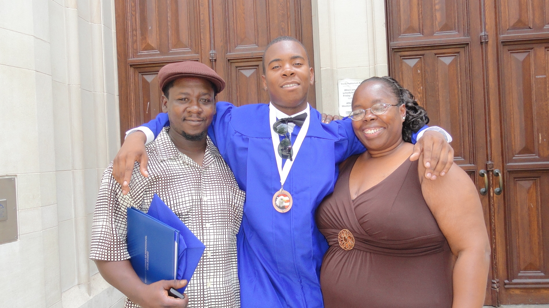 Jacques Cherry celebrates his graduation from Excel Academy with his parents Everett Taylor and Reba Cherry. Photo courtesy of Ceislet Media & Issue Advocacy.