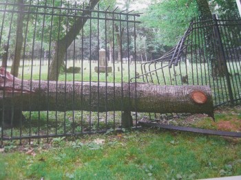 The fence surrounding the small cemetery on Holme Avenue is need of repair after storm-related damage. Image provided by Elsie Stevens.