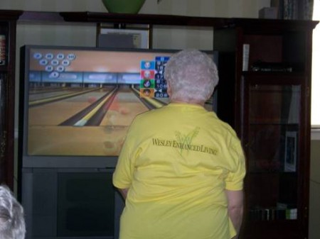 Eleanor Schol from Wesley Enhanced Living Pennypack Park competes in the Wii Bowling Tournament. Photo courtesy of Wesley Enhanced Living.