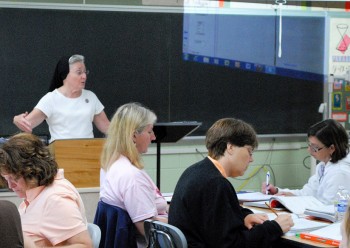 Sister Alice Hess of Archbishop Ryan assists archdiocesan eighth grader teachers with their algebra lessons. Photos courtesy of Archbishop Ryan High School.