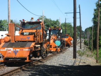 SEPTA crews work on the Fox Chase Line along the 7800-block of Oxford Avenue.