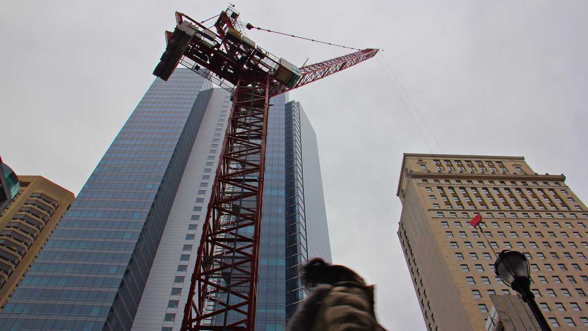 A large crane looms over Chestnut Street.