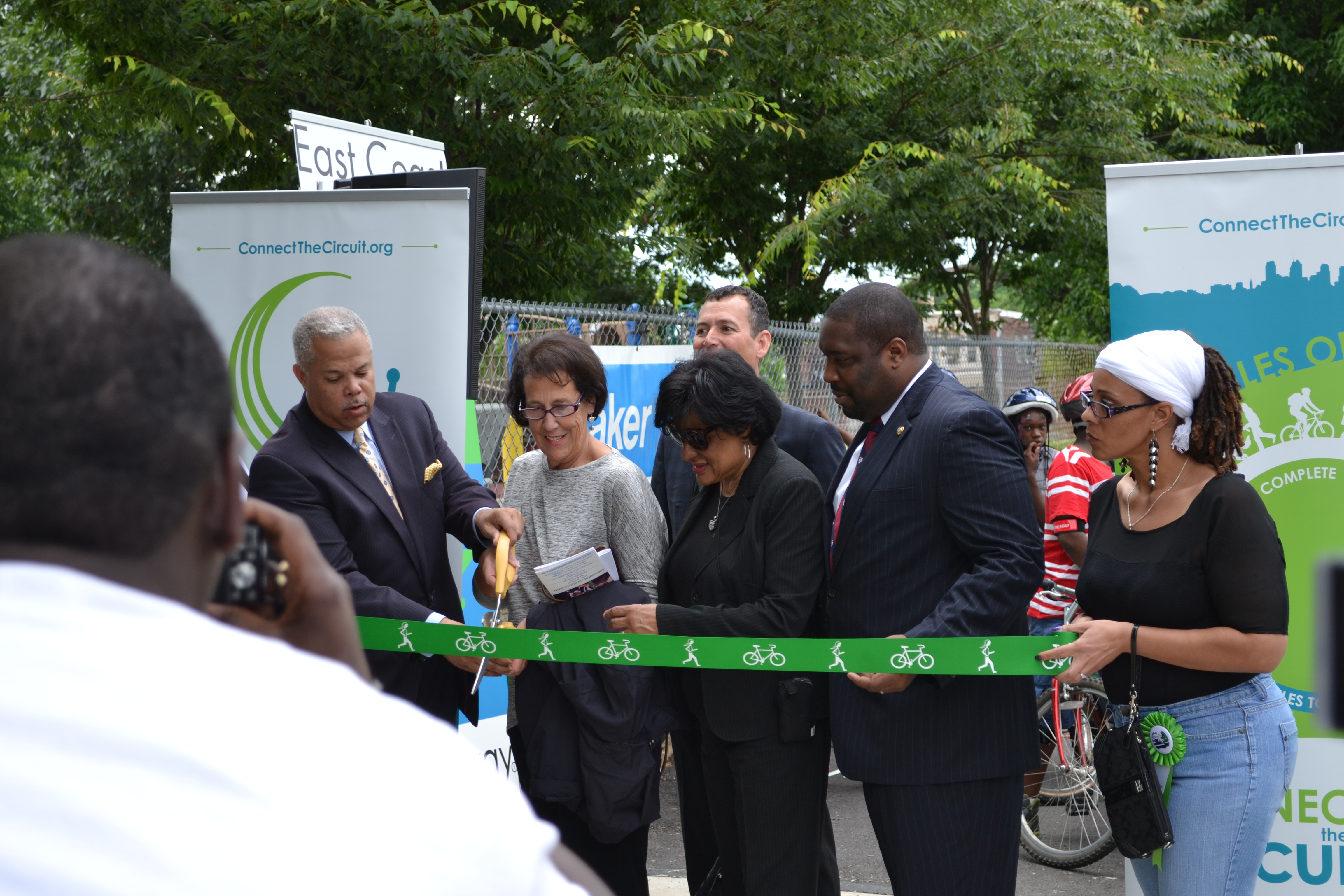 City and state officials along with project leaders cut the 58th Street Greenway ribbon
