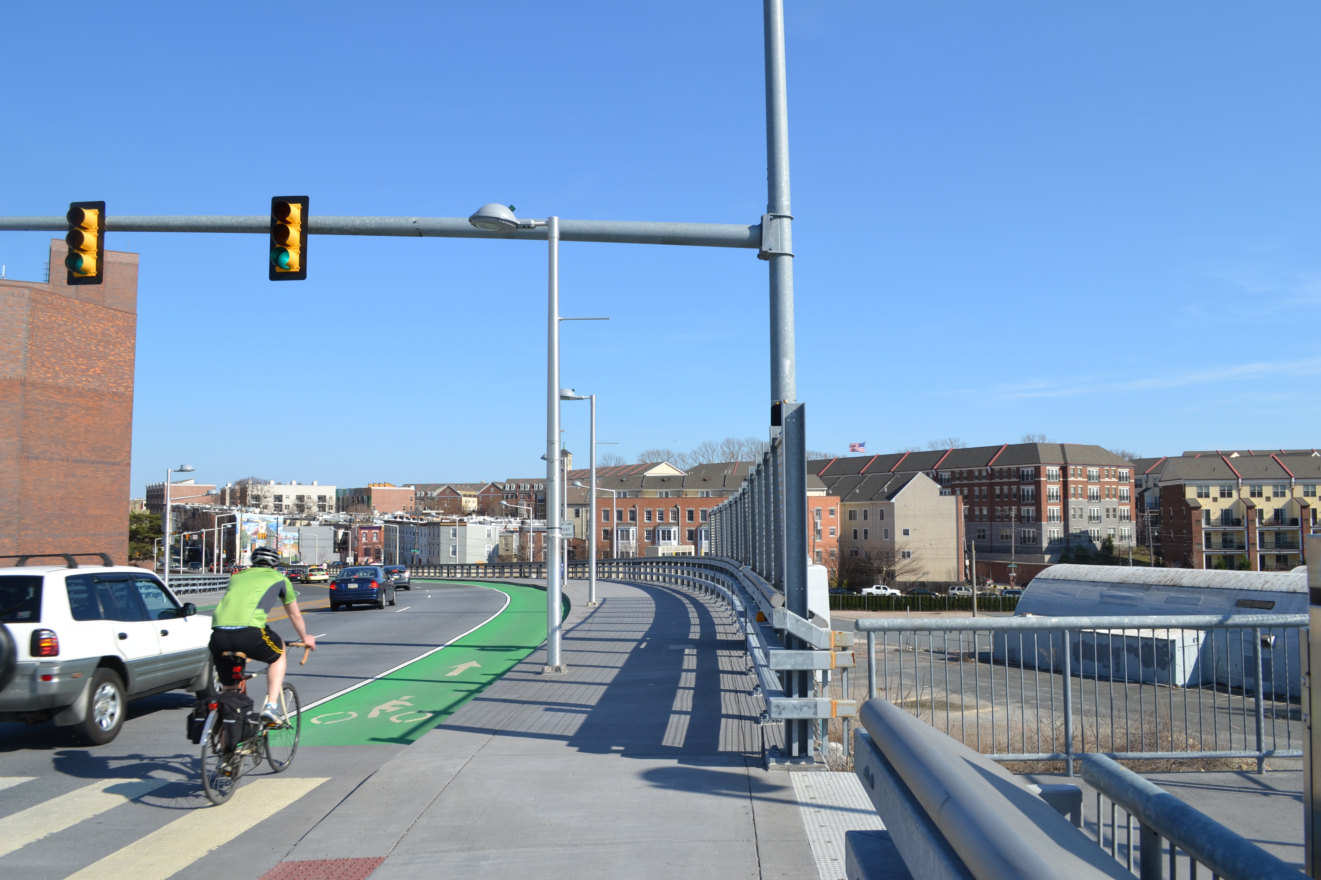 The Bicycle Coalition of Greater Philadelphia wants to shift the bike lanes closer to the top of the bridge to reduce conflicts with the proposed driveways